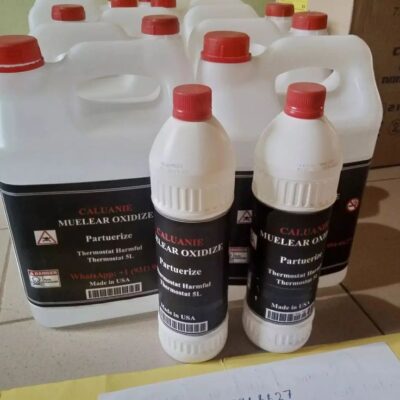 Laboratory experiment showing the oxidation process of Caluanie Muelear with safety equipment in use.